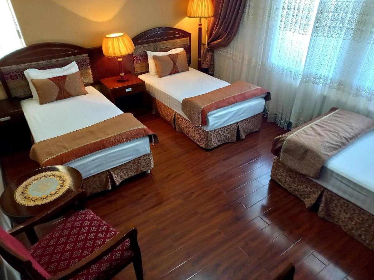 Kamelot Hotel Buchara Buitenkant foto