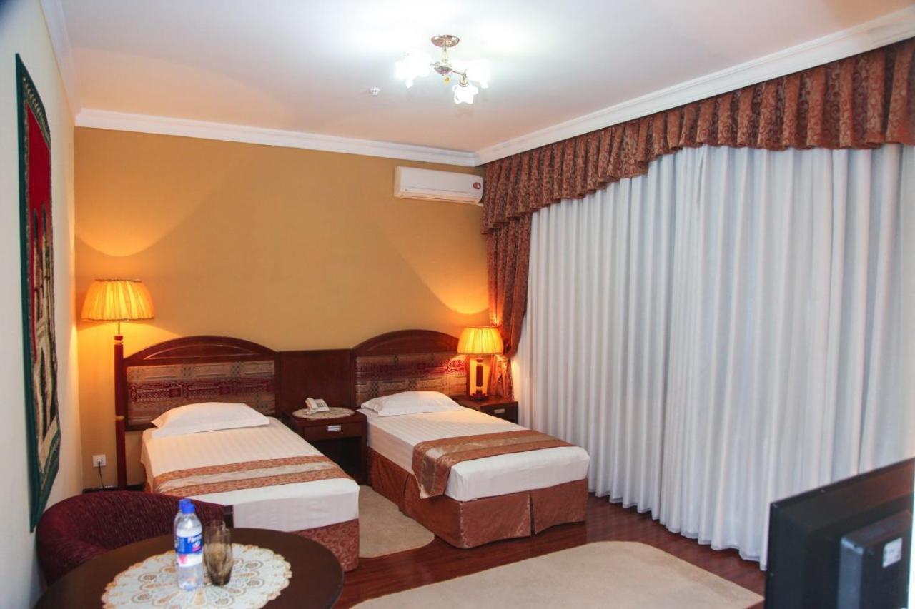 Kamelot Hotel Buchara Buitenkant foto